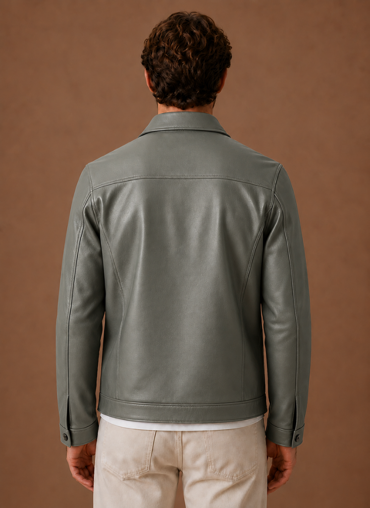Men's jacket featuring a full-zip closure and side pockets, designed with a classic leather look for a stylish and versatile outerwear option. 2