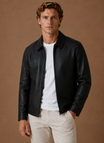 Men's jacket featuring a full-zip closure and side pockets, designed with a classic leather look for a stylish and versatile outerwear option. 4