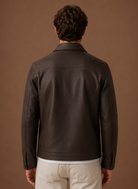Men's jacket featuring a full-zip closure and side pockets, designed with a classic leather look for a stylish and versatile outerwear option. 7