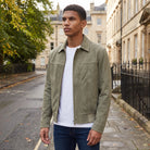 Men's jacket featuring a full zip closure and point collar, designed in a casual suede-look style made from synthetic fabric, perfect for versatile everyday wear. 1