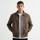 Men's jacket featuring a full zip closure and point collar, designed in a casual suede-look style made from synthetic fabric, perfect for versatile everyday wear. 9