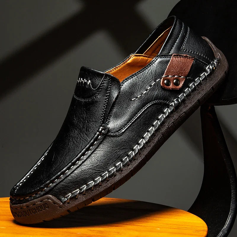 Men's leather slip-on loafers featuring a cushioned insole and a glossy finish, ideal for both casual and formal occasions. 3