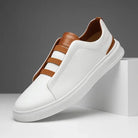 Men's leather slip-on trainers featuring loop lacing, designed for comfort and casual wear, made with a genuine leather upper and durable rubber outsole. 0