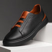 Men's leather slip-on trainers featuring loop lacing, designed for comfort and casual wear, made with a genuine leather upper and durable rubber outsole. 2