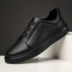 Men's leather slip-on trainers featuring loop lacing, designed for comfort and casual wear, made with a genuine leather upper and durable rubber outsole. 4