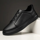 Men's leather slip-on trainers featuring loop lacing, designed for comfort and casual wear, made with a genuine leather upper and durable rubber outsole. 4