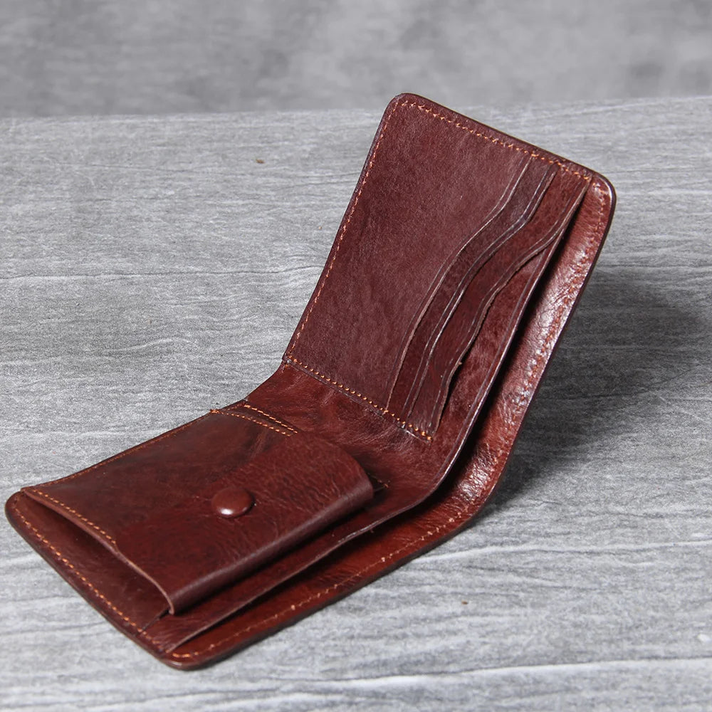 Men's leather wallet featuring a slim bi-fold design, durable cowhide material, and a convenient snap coin pocket, ideal for stylish and organized storage. 2