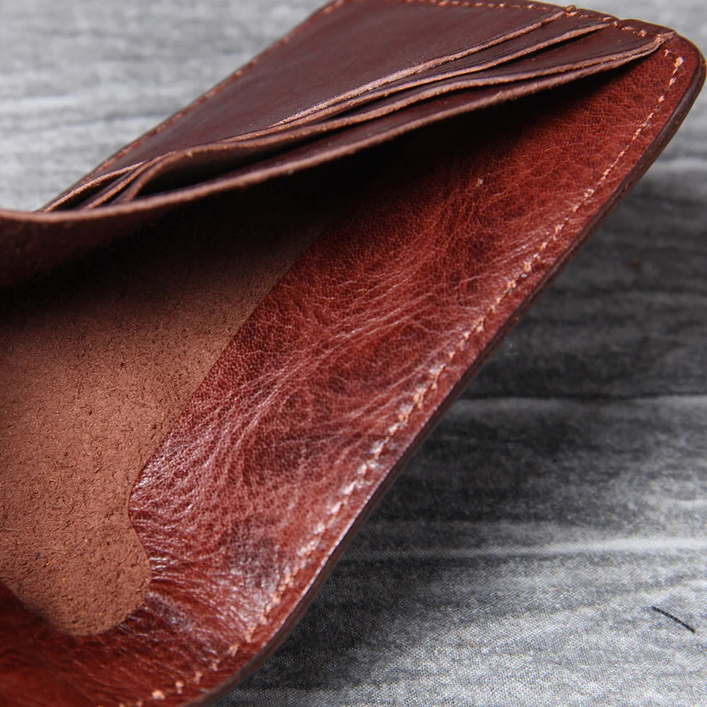 Men's leather wallet featuring a slim bi-fold design, durable cowhide material, and a convenient snap coin pocket, ideal for stylish and organized storage. 5