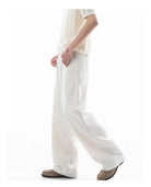 Men's linen trousers with a relaxed fit, perfect for summer; breathable fabric ideal for casual and work wear, featuring a comfortable style and versatile design. 2