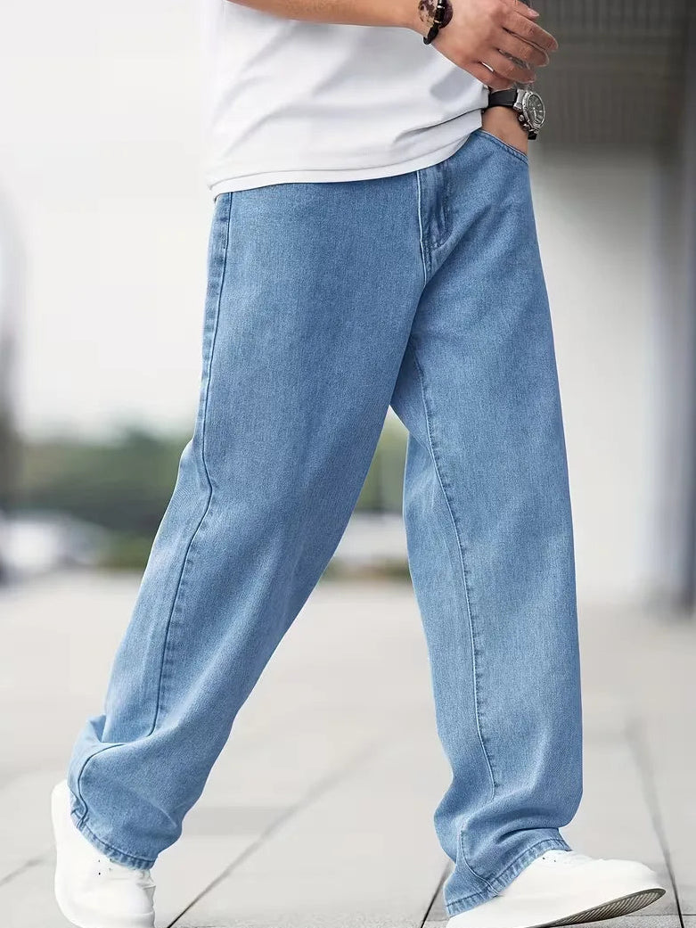 Men's mid-rise baggy jeans featuring a light wash and relaxed fit, perfect for casual wear and comfortable style. 0