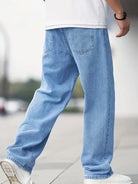 Men's mid-rise baggy jeans featuring a light wash and relaxed fit, perfect for casual wear and comfortable style. 3