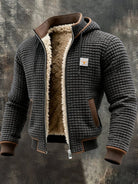 Men's quilted jacket featuring a cozy sherpa fleece lining and an adjustable hood, designed for warmth and style in winter outerwear. 0