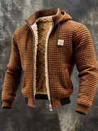 Men's quilted jacket featuring a cozy sherpa fleece lining and an adjustable hood, designed for warmth and style in winter outerwear. 4