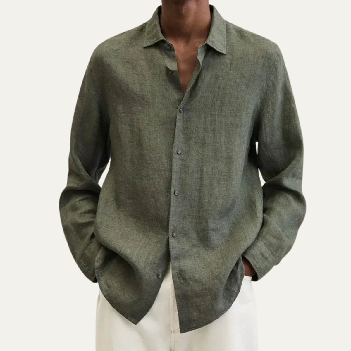 Men's long sleeve button-up shirt featuring a relaxed fit and smooth woven fabric, available in multiple colors for versatile styling. 1