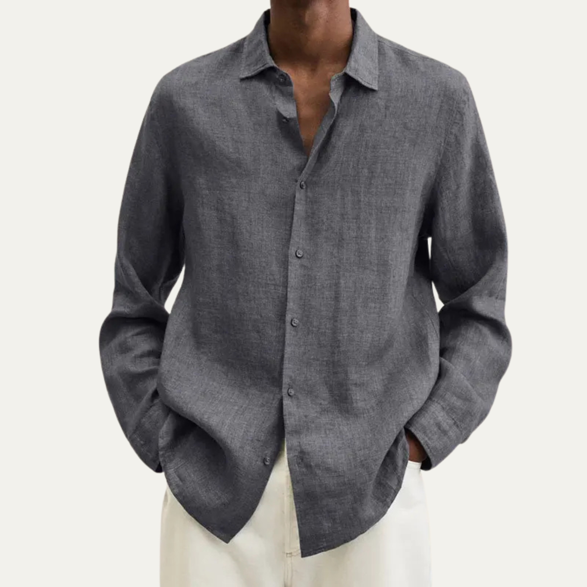 Men's long sleeve button-up shirt featuring a relaxed fit and smooth woven fabric, available in multiple colors for versatile styling. 2