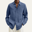 Men's long sleeve button-up shirt featuring a relaxed fit and smooth woven fabric, available in multiple colors for versatile styling. 3