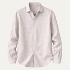 Men's long sleeve button-up shirt featuring a relaxed fit and smooth woven fabric, available in multiple colors for versatile styling. 6