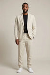 Men's suit set featuring a relaxed fit blazer and trousers made from breathable linen fabric, perfect for versatile formal and casual occasions. 0