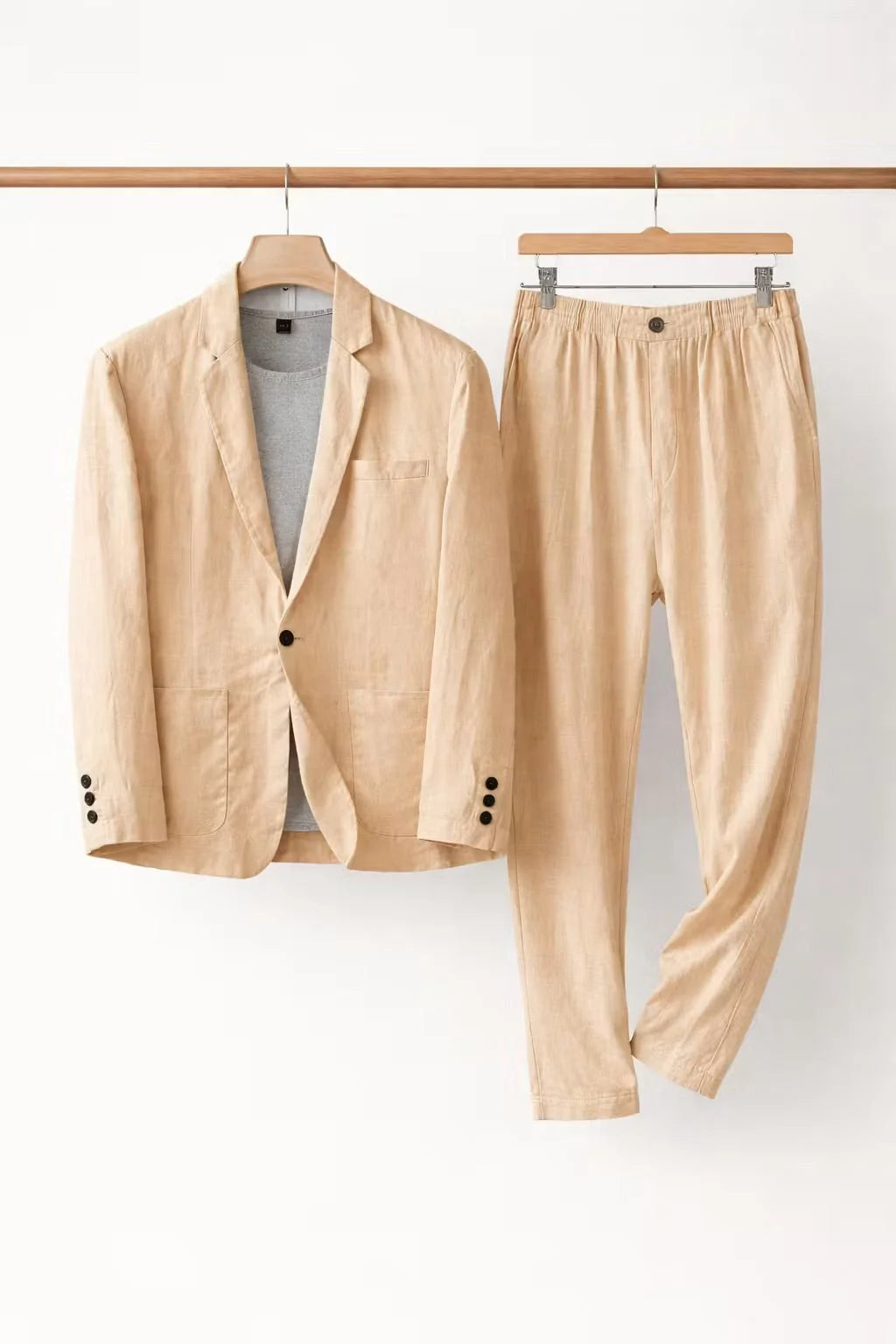 Men's suit set featuring a relaxed fit blazer and trousers made from breathable linen fabric, perfect for versatile formal and casual occasions. 10