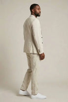 Men's suit set featuring a relaxed fit blazer and trousers made from breathable linen fabric, perfect for versatile formal and casual occasions. 2