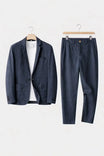 Men's suit set featuring a relaxed fit blazer and trousers made from breathable linen fabric, perfect for versatile formal and casual occasions. 7