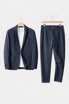 Men's suit set featuring a relaxed fit blazer and trousers made from breathable linen fabric, perfect for versatile formal and casual occasions. 7