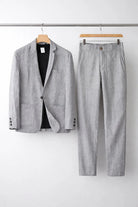 Men's suit set featuring a relaxed fit blazer and trousers made from breathable linen fabric, perfect for versatile formal and casual occasions. 8