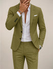 Men's tailored fit suit made from lightweight fabric, perfect for elegant spring weddings and formal occasions. 0