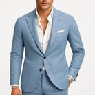 Men's tailored fit suit made from lightweight fabric, perfect for elegant spring weddings and formal occasions. 1