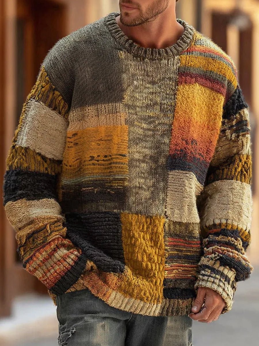 Men's sweater featuring a patchwork colorblock design in mustard, gray, rust, and beige, with a relaxed crew-neck knit style. 0
