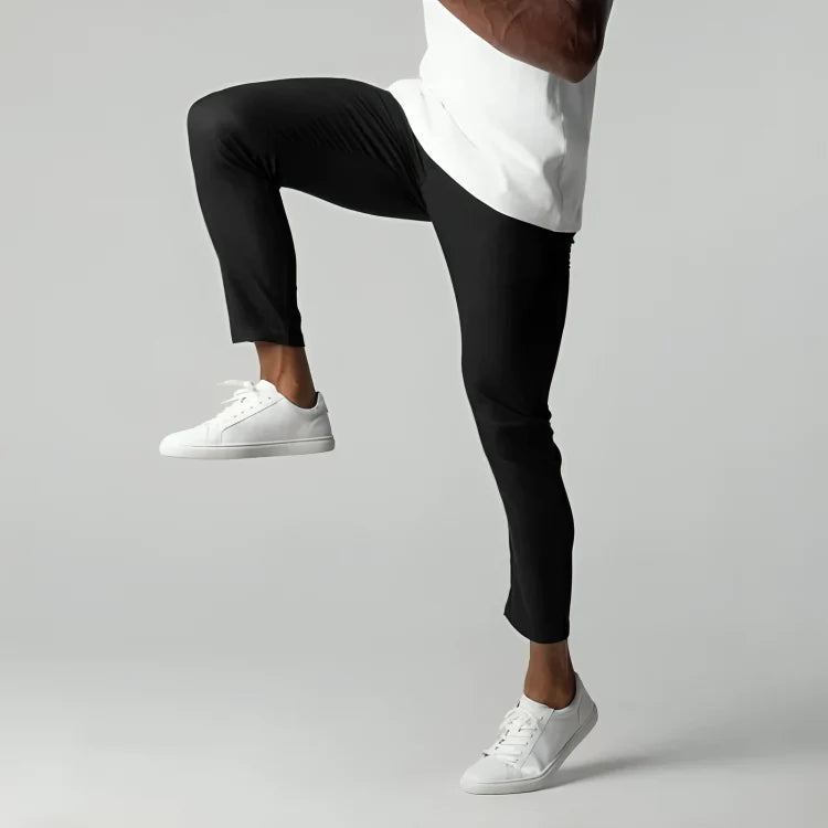 Men's slim-fit stretch chinos with tapered leg, perfect for comfortable and versatile casual wear, featuring a stylish design suitable for various occasions. 2