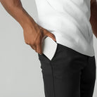 Men's slim-fit stretch chinos with tapered leg, perfect for comfortable and versatile casual wear, featuring a stylish design suitable for various occasions. 3
