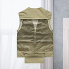 Men's lightweight polyester vest featuring a breathable mesh back and multi-pocket design, ideal for outdoor activities such as hiking, camping, and fishing. 1