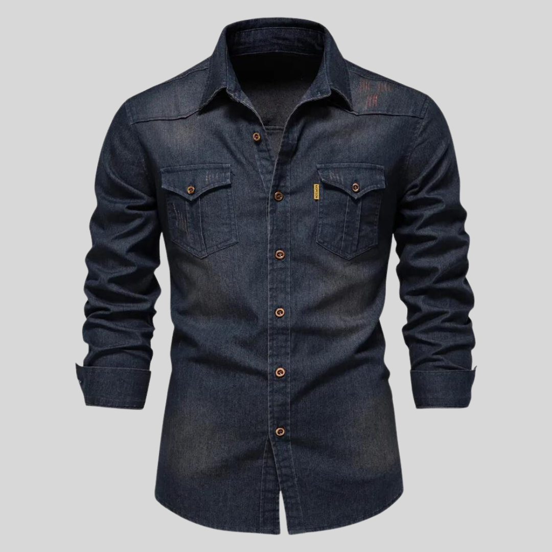 Men's washed denim shirt featuring a button-up front, long sleeves, and twin flap pockets, perfect for casual wear. 0