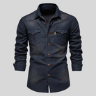 Men's washed denim shirt featuring a button-up front, long sleeves, and twin flap pockets, perfect for casual wear. 0