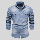 Men's washed denim shirt featuring a button-up front, long sleeves, and twin flap pockets, perfect for casual wear. 3
