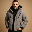Men's winter jacket featuring a thick padded design and durable zipper, perfect for outdoor activities in cold weather. 1