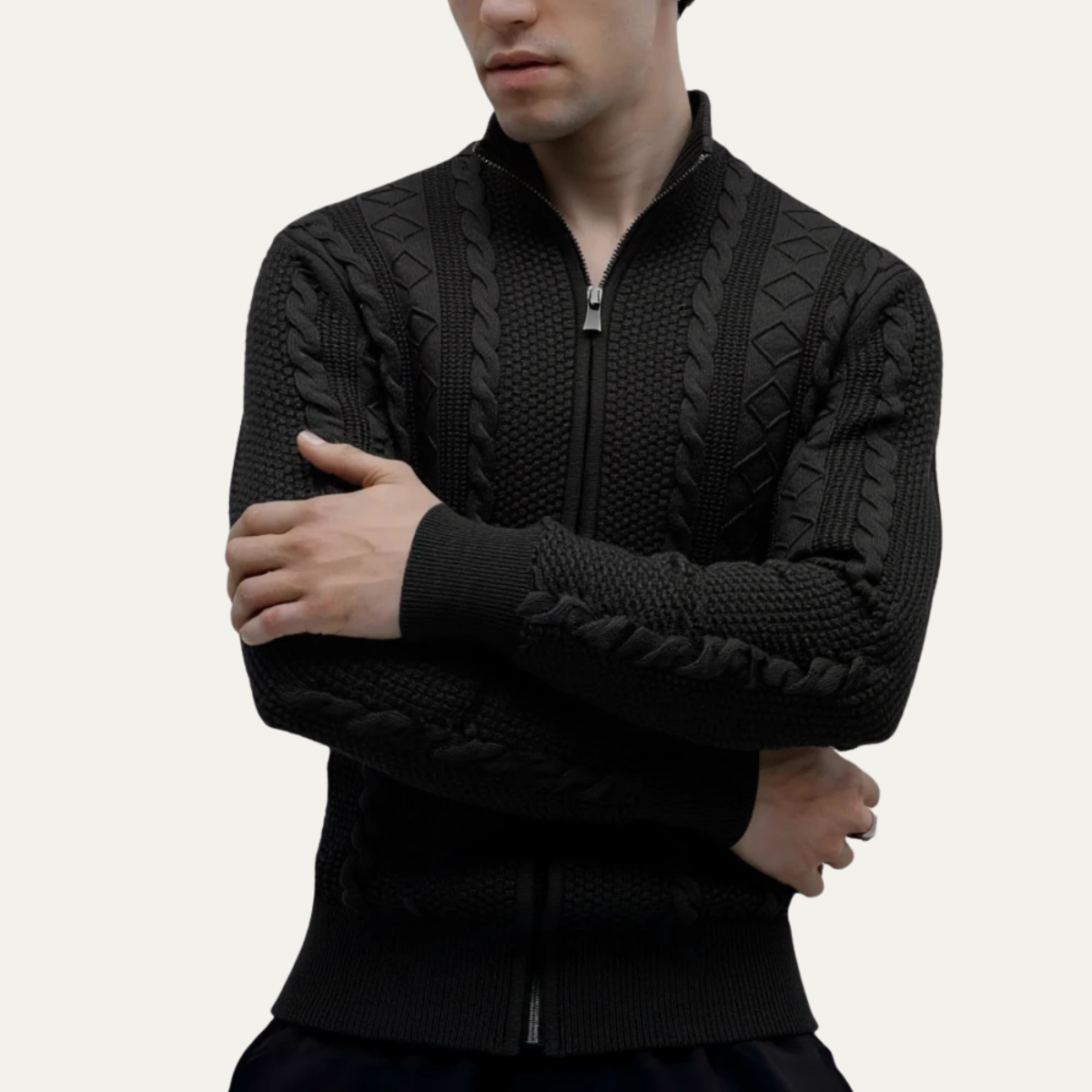 Men's zip up cardigan in soft black knit featuring a stylish stand collar and intricate cable knit design, perfect for layering in cooler weather. 2