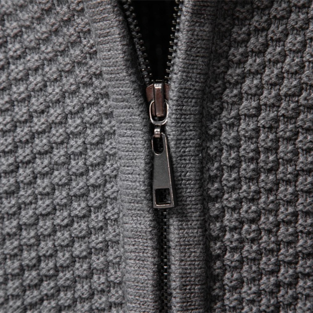 Men's zip up cardigan in soft black knit featuring a stylish stand collar and intricate cable knit design, perfect for layering in cooler weather. 4