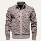 Men's black zip-up cardigan featuring a textured knit design, crafted from soft stretch fabric, with functional pockets for added convenience. 2