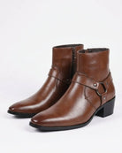Men's black ankle boots featuring a stylish harness strap and pointed toe, crafted from polished leather for a sleek and sophisticated look. 0