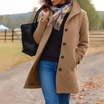 Mid length wool coat for women featuring a high collar, made from warm wool-blend fabric, designed for an elegant fit above the knee. 0