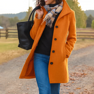 Mid length wool coat for women featuring a high collar, made from warm wool-blend fabric, designed for an elegant fit above the knee. 6