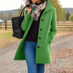 Mid length wool coat for women featuring a high collar, made from warm wool-blend fabric, designed for an elegant fit above the knee. 9