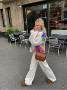 Multicolor cardigan for women featuring a relaxed fit, made from soft plush fabric, perfect for cozy layering in any season. 2