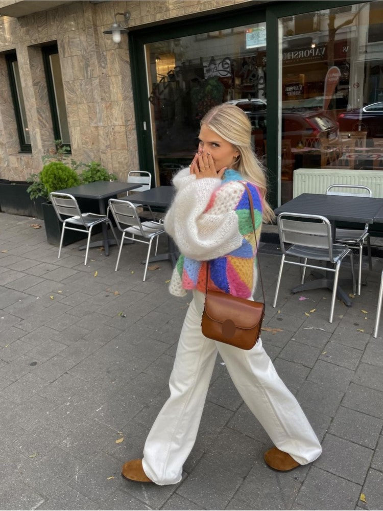Multicolor cardigan for women featuring a relaxed fit, made from soft plush fabric, perfect for cozy layering in any season. 2