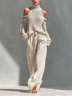 Off-shoulder two piece set featuring wide-leg trousers, showcasing a modern feminine design perfect for women’s casual or dressy occasions. 0