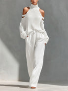 Off-shoulder two piece set featuring wide-leg trousers, showcasing a modern feminine design perfect for women’s casual or dressy occasions. 2