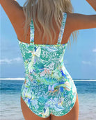 One Piece Swimsuit with Tummy Control featuring a vibrant botanical print, designed to flatter women's figures and enhance confidence at the beach or pool. 1