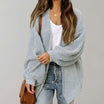 Oversized chunky knit cardigan with balloon sleeves, featuring a soft open front design, perfect for women's layering in cool weather. 2